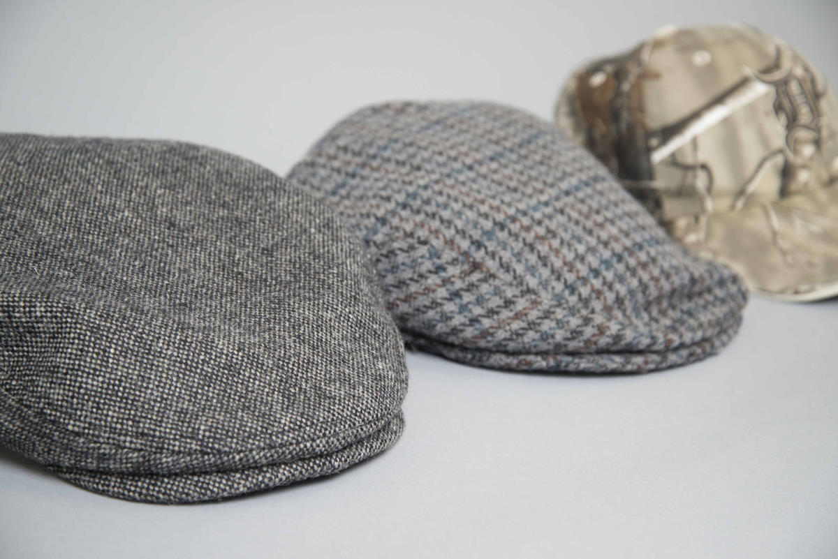 three different styles of caps drycleaned
