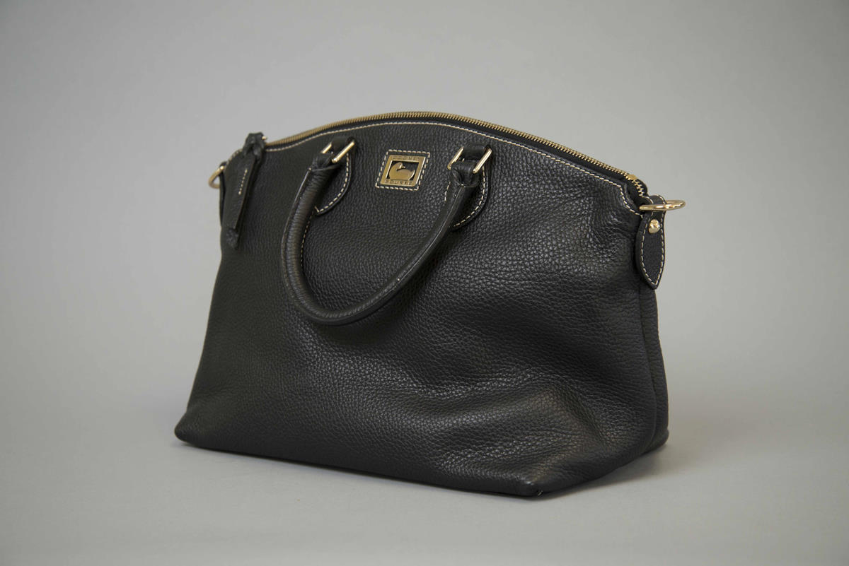 single black leather purse drycleaned